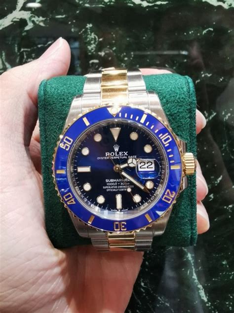 rolex submariner half gold blue|rolex submariner value chart.